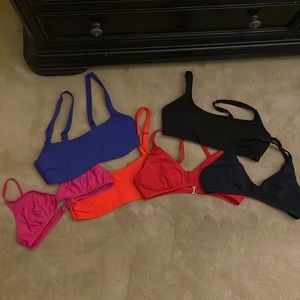 Assorted bikini tops. J.crew, Andie, Athleta, everlane